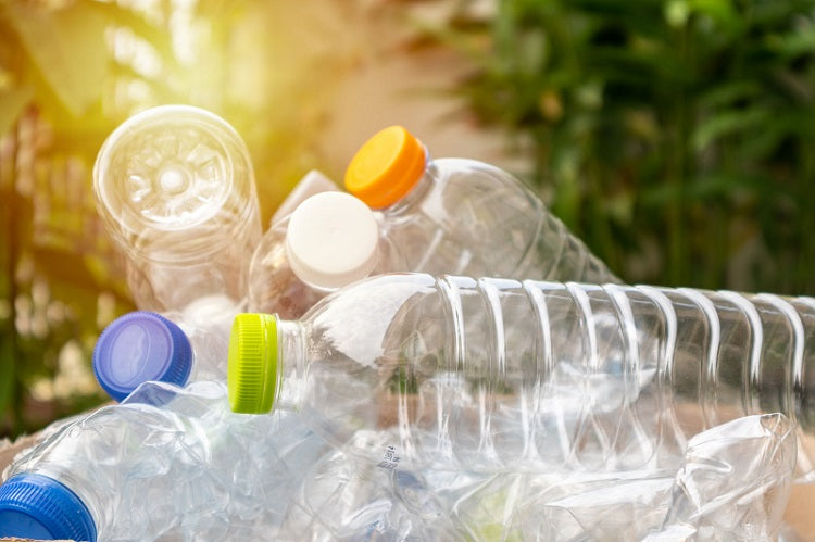 BPA-free recycled plastic water bottles used in A Little Pillow Company's USA made certified-safe hypoallergenic flex-fill